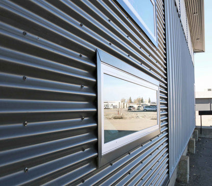32" 7/8 Corrugated steel panels on a building